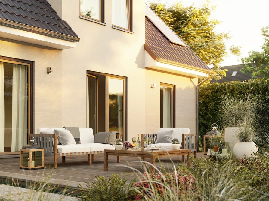 Erleben Sie die Detailansicht der Terrasse des Einfamilienhauses Flair 134 mit bodentiefen Fenstern für einen wunderschönen Blick in den Garten.